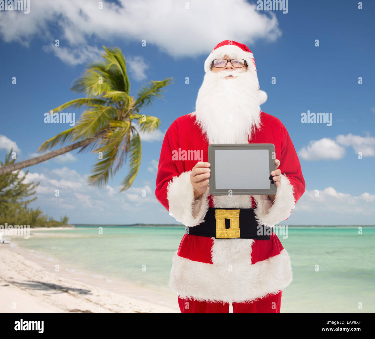 man in costume of santa claus with tablet pc Stock Photo - Alamy