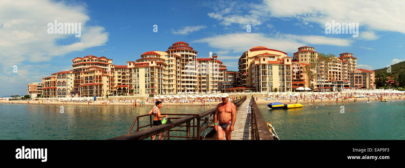 Sunny beach, Bulgaria - June 13, 2011: A man is walking on a quay at the bay of Sunny beach in Bulgaria. Stock Photo