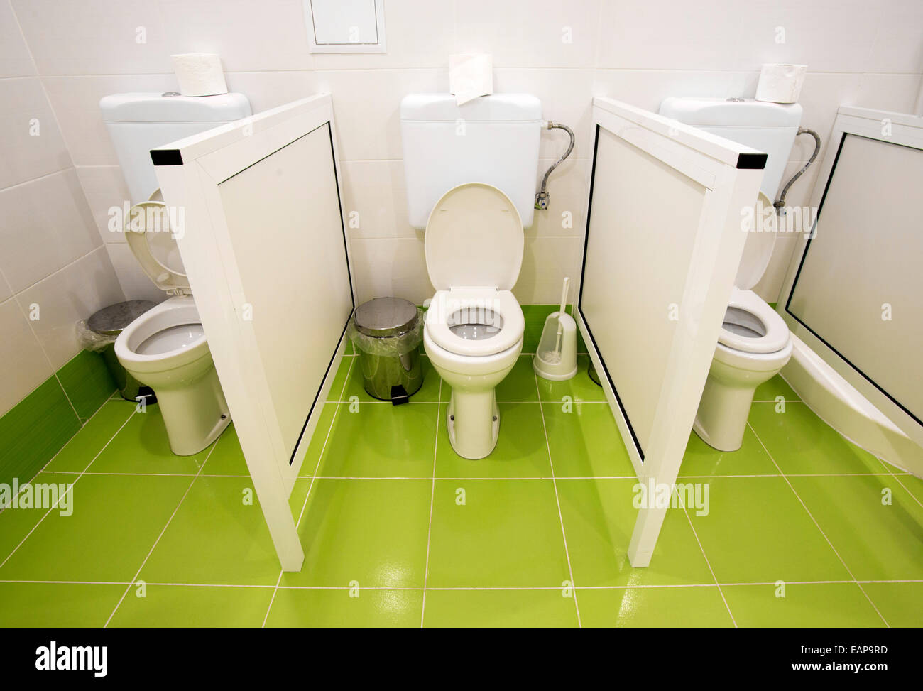 Small toilets for kids in a kindergarten. Stock Photo