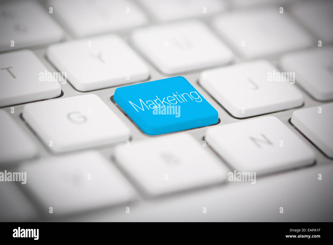 The word "MARKETING" written on metallic keyboard Stock Photo