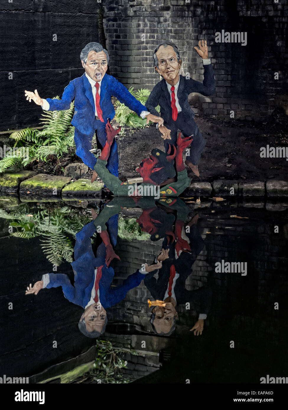 Graffiti of Bush and Blair the on Regents Park canal London Stock Photo