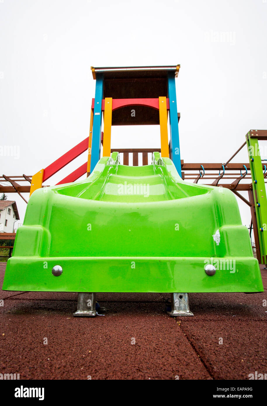 Slide on an empty playground Stock Photo - Alamy