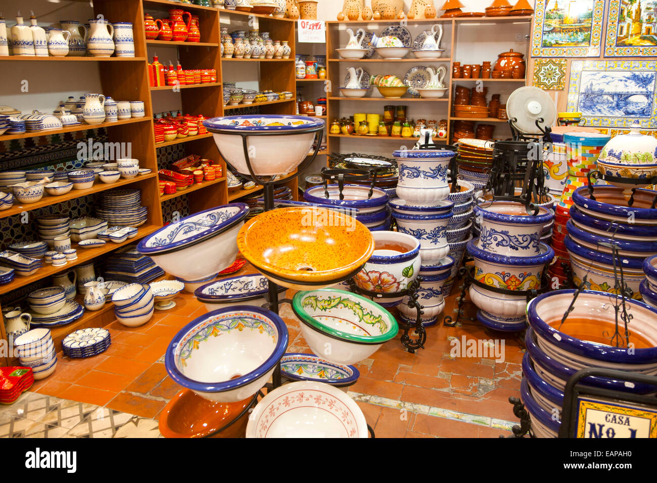 Display of tiles and pottery inside Santa Ana ceramic tile shop in Triana,  Seville, Spain Stock Photo - Alamy
