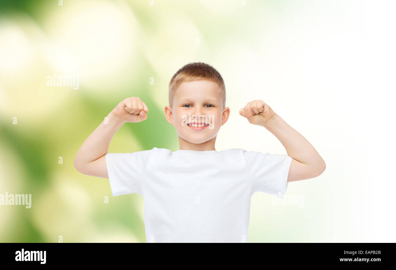 Boy flexing his arms hires stock photography and images Alamy