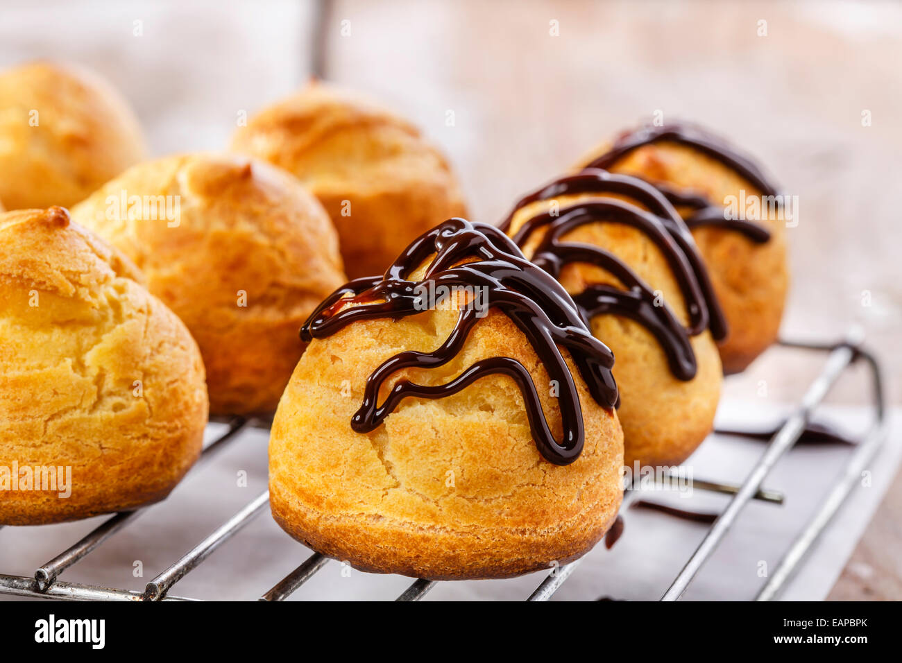 Eclair with chocolate sweet dessert Stock Photo