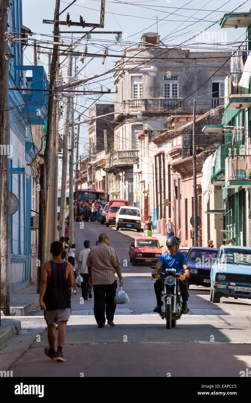 MATANZAS, CUBA - MAY 10, 2014: People on a busy downtown street in the city of Matanzas, Cuba Stock Photo