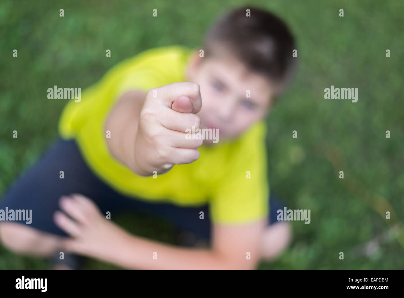 Teen boy shows the hand gesture Stock Photo