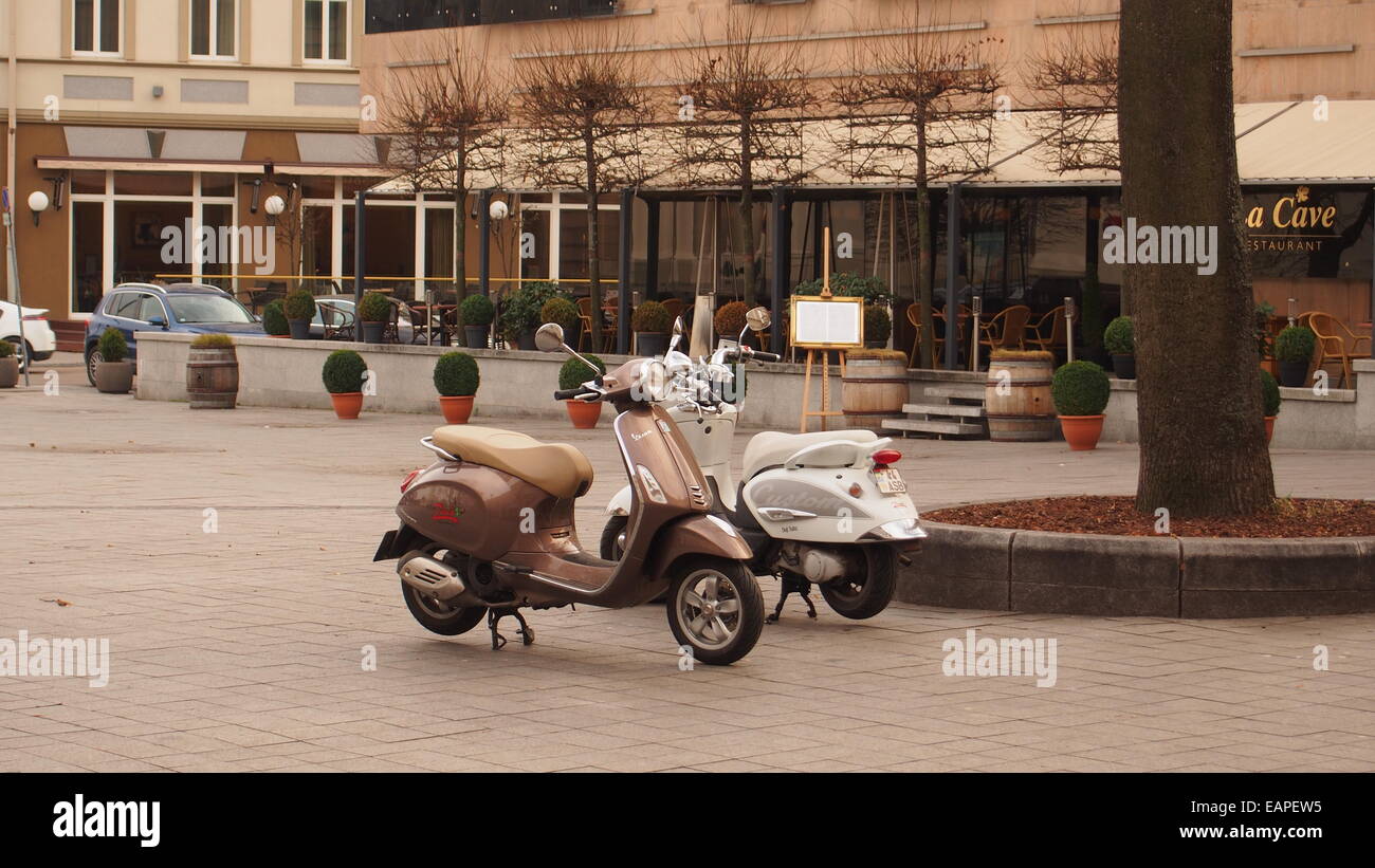 Vilnius,Lithuania. A couple of parked Vespa scooters Stock Photo Alamy