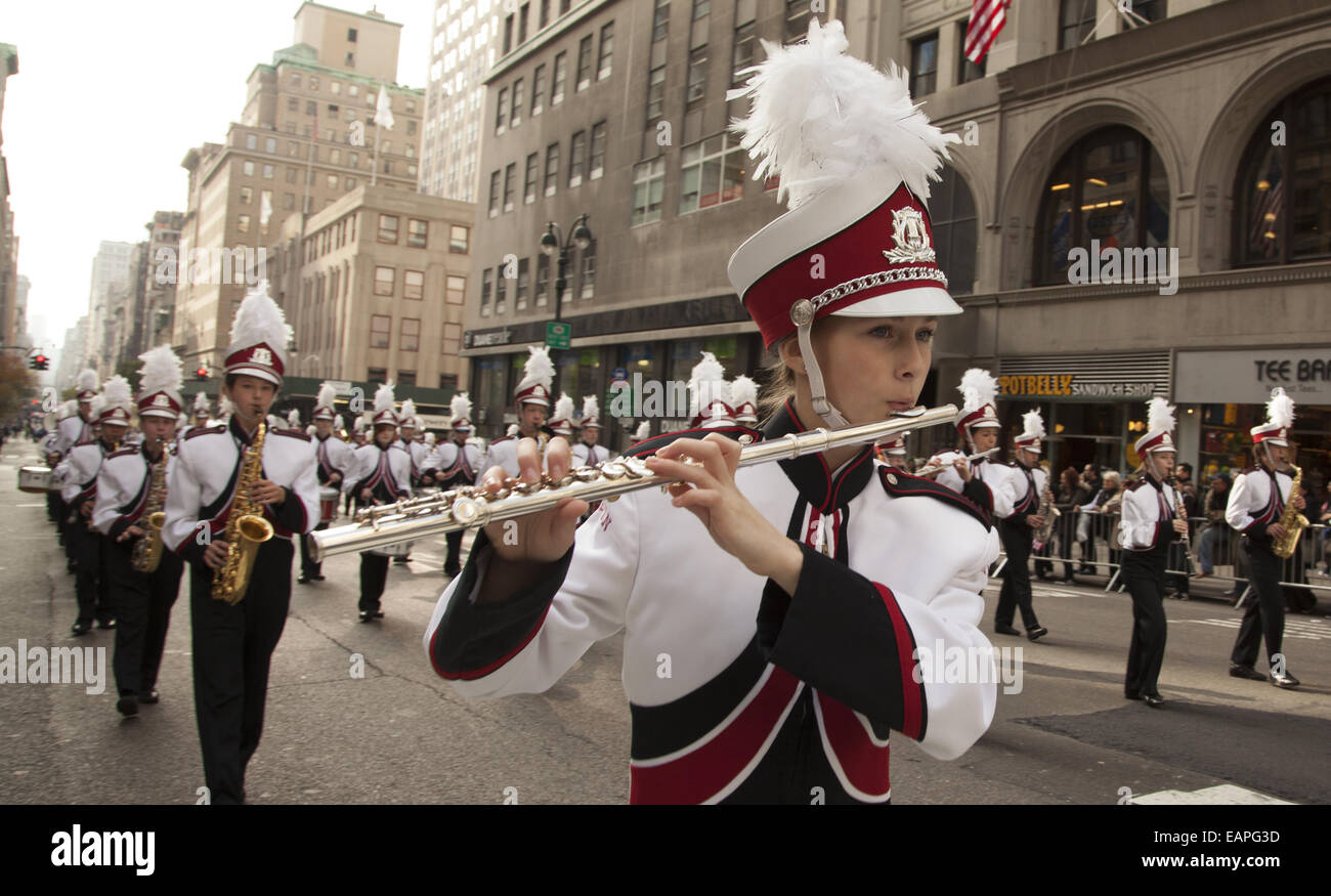 High school marching band marches up 5th Ave. at the Veterans day