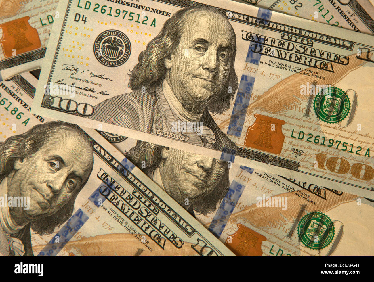 Newest US $100 bills as of 2013 with an embedded magnetic strip among other qualities difficult to forge. Stock Photo