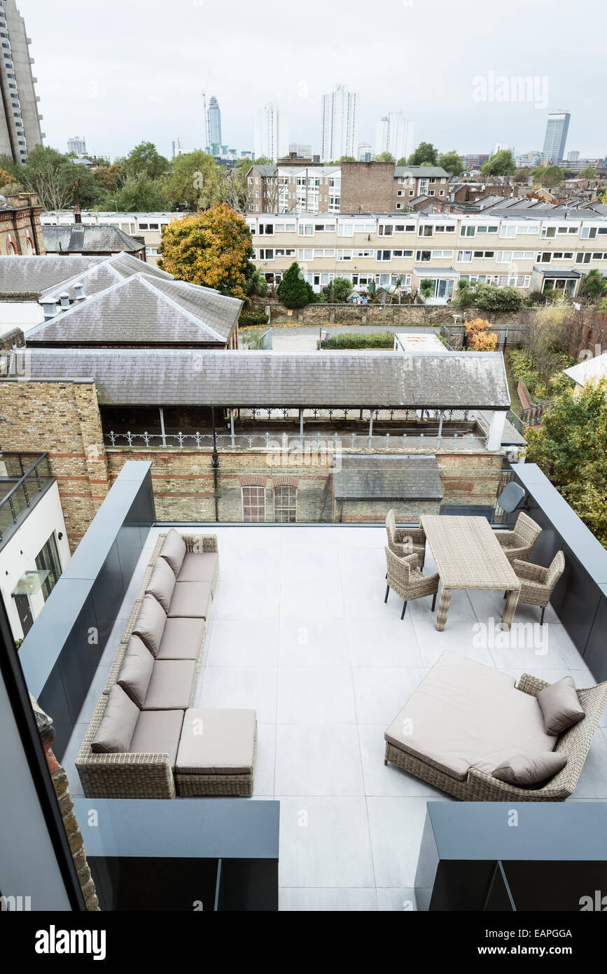 Outdoor furniture by OKA on roof terrace with London views Stock Photo