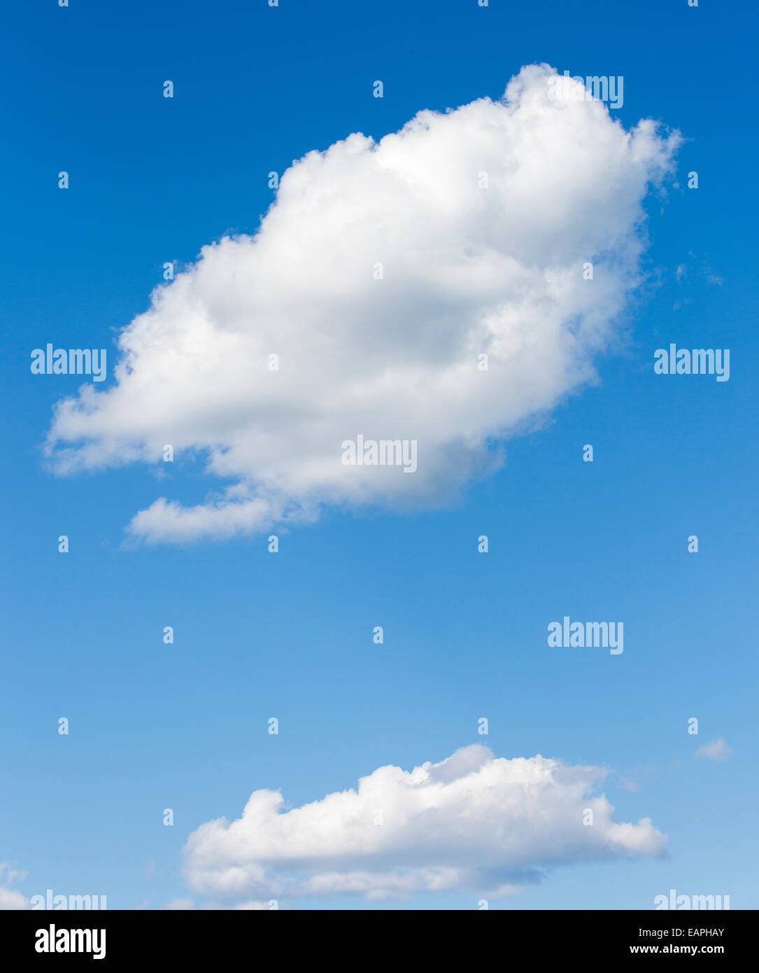 Two white clouds on blue sky , Finland Stock Photo - Alamy