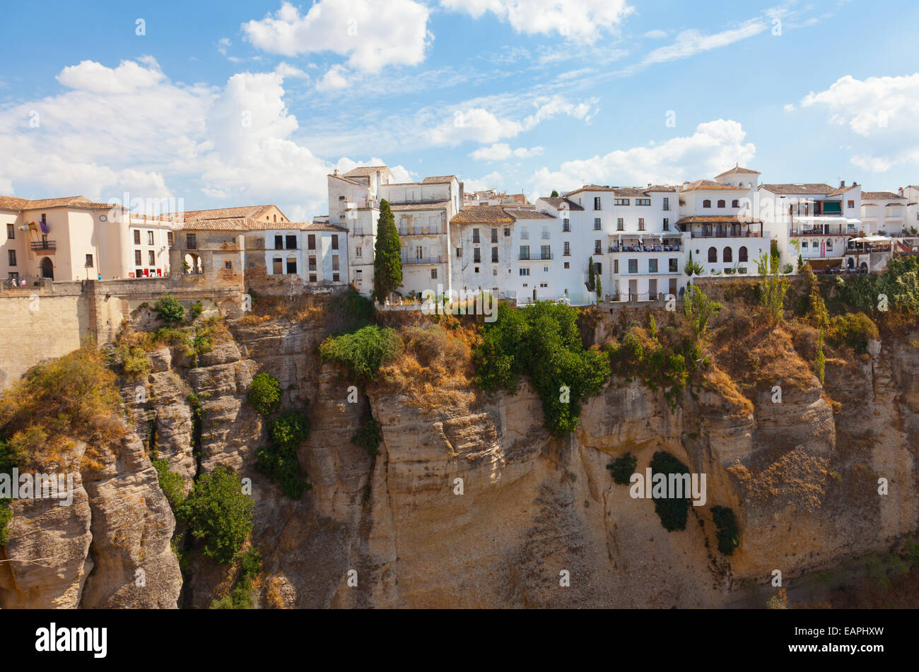 new bridge and houses on the edge of an abyss in the city Rhonda, Spain Stock Photo