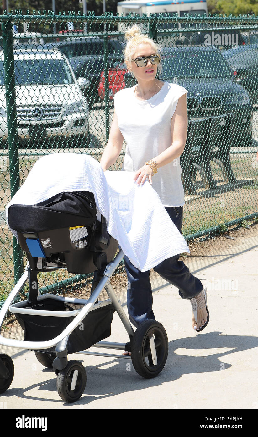 Gwen Stefani brings new baby Apollo Rossdale along to watch her older ...