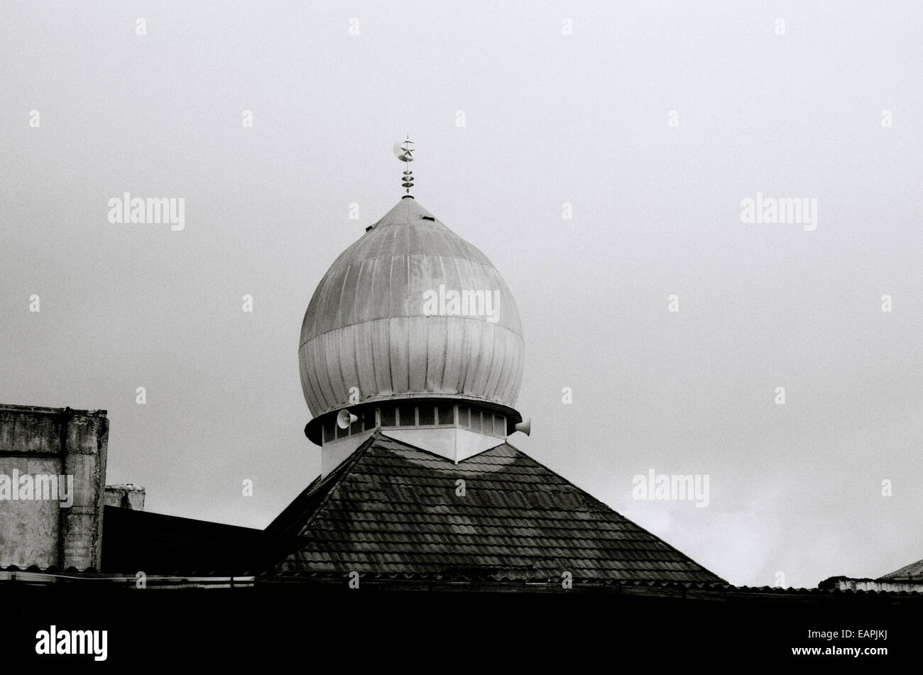 Islamic onion dome on an urban Muslim mosque building in Yogyakarta in