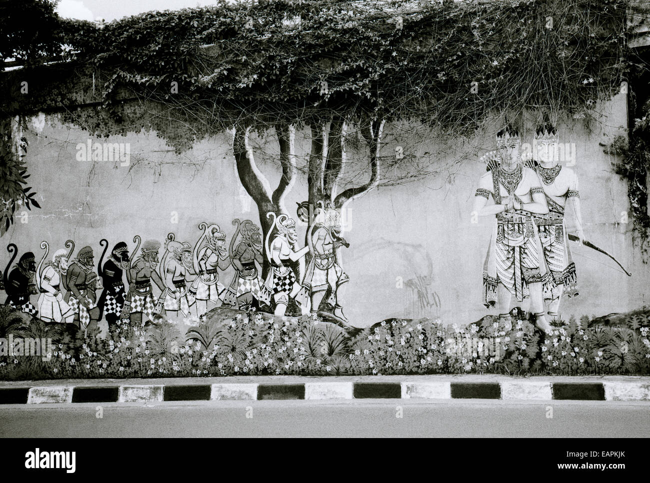 Urban Hindu religious graffiti art in Yogyakarta in Java in Indonesia in Southeast Asia Far East. b&w Ramayana Mahabharat Travel Stock Photo
