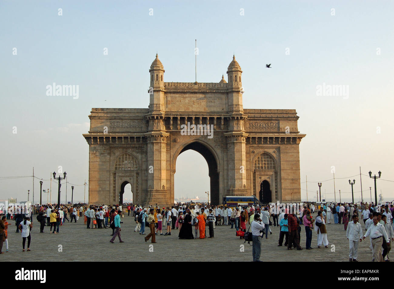 Pedestrians enjoying the evening at the Gateway to India Mumbai Stock Photo