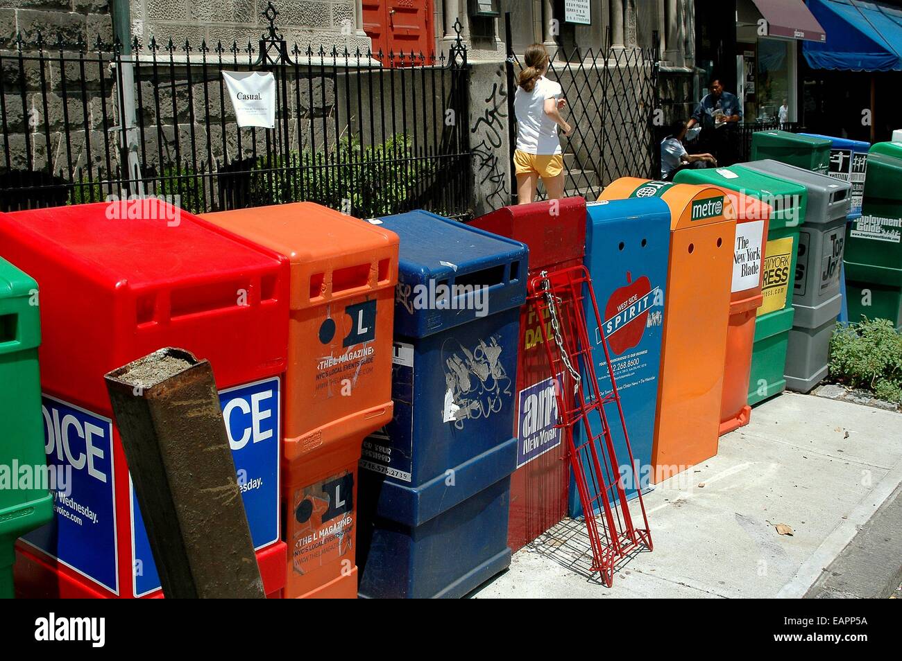NYC Plastic newspaper boxes lined up in a row next to the 79th Street