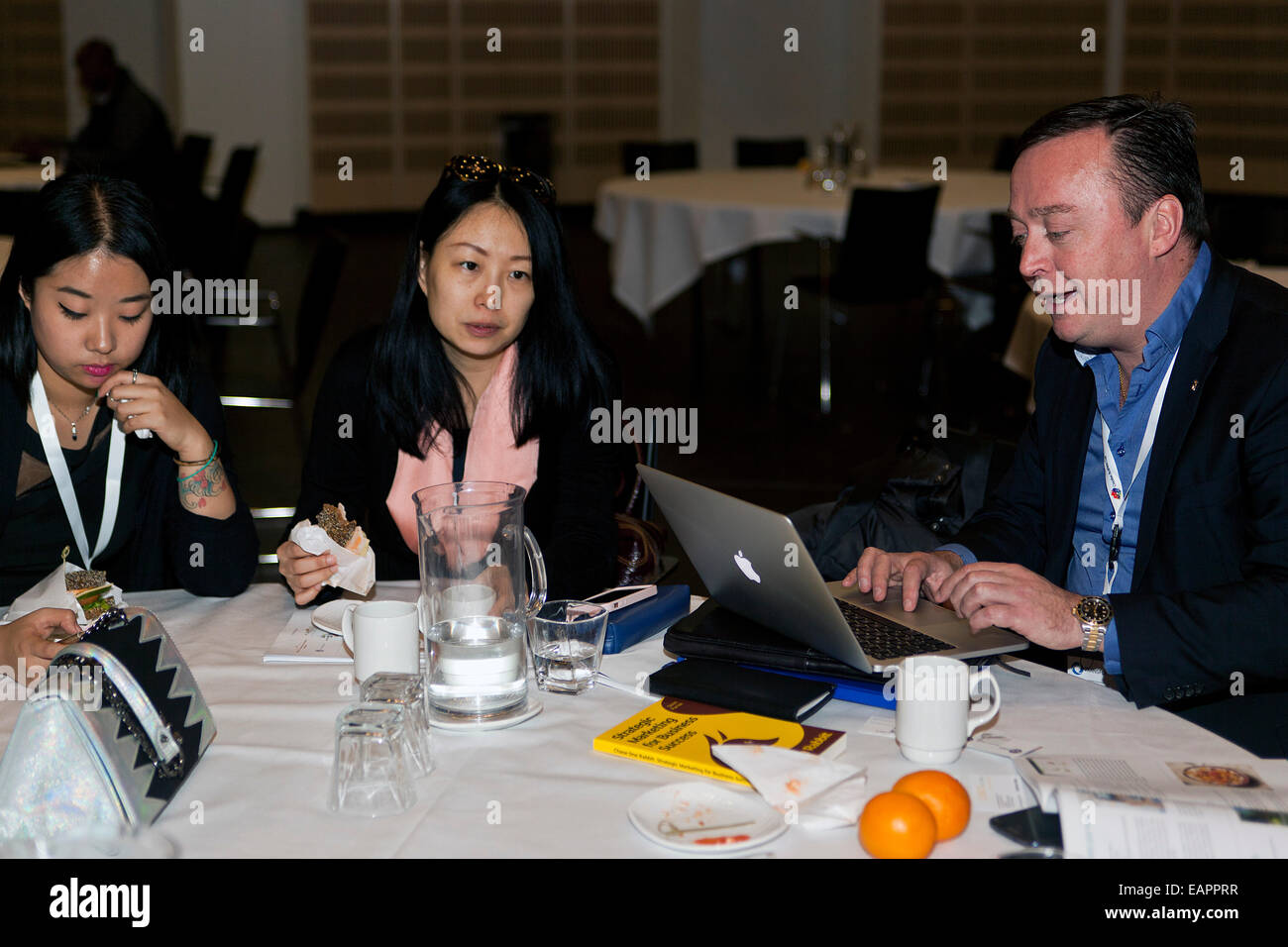 Copenhagen, Denmark, November 19th, 2014: Young entrepreneurs discuss how to pitch their ideas for the jury just before the Creative Business Cup final in Copenhagen. Like entrepreneurs from 55 other cou8ntries, which gathered in the Danish capital, they compete together with national champions from 55other countries in being world best young creative entrepreneurs Stock Photo
