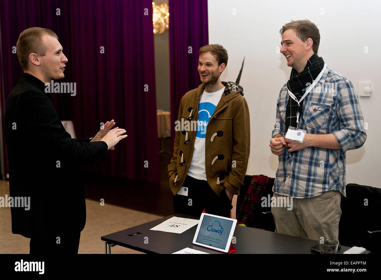Copenhagen, Denmark, November 19th, 2014: UK start-up company, CLOWDY, presents at the Creative Business Cup finals in Copenhagen a new software invention for creative people – designers, writers, photographers, musicians  – which proposes a unique communication platform between creators and clients/users. Owners: (photo, right) Stuart Logan and (photo mid) Damien Shiells Stock Photo