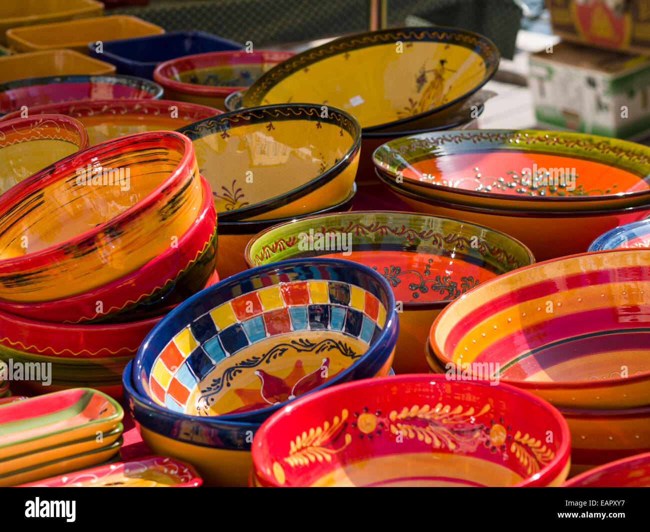Colourful Bowls at the Market. An array of brightly fired bowls make a