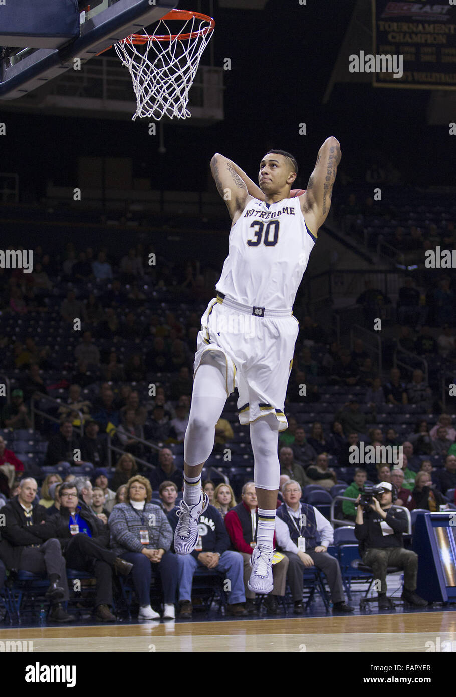 November 19, 2014 Notre Dame forward Zach Auguste (30) goes up for the