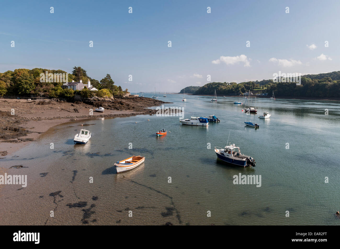 View towards Ynys Gaint and bangor pier on the Menai Strait Anglesey North Wales Stock Photo
