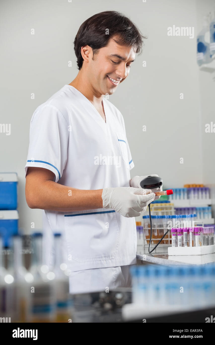 Technician Scanning Barcode On Test Tube Stock Photo - Alamy