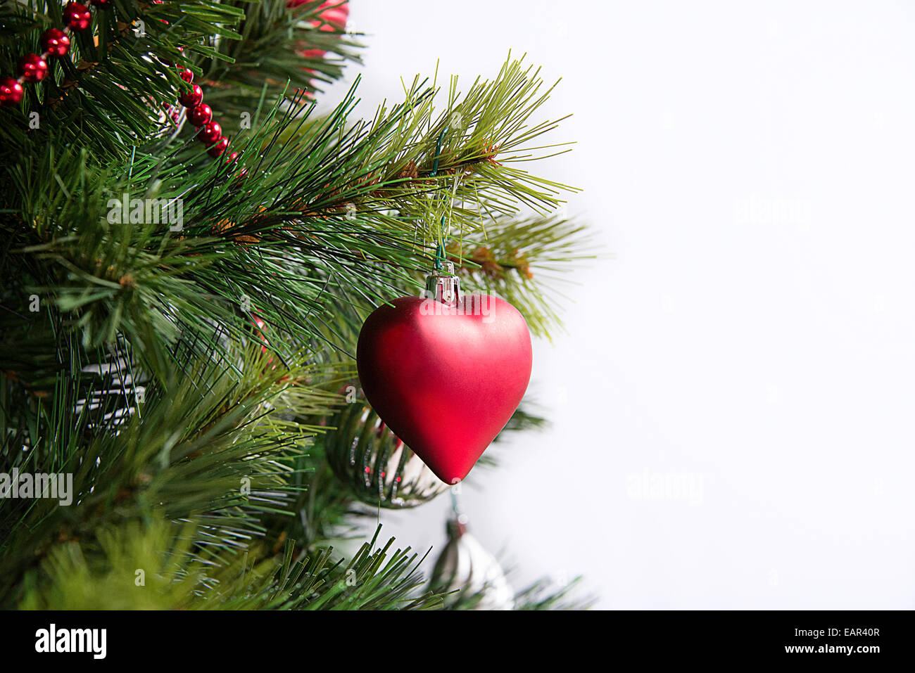 A Christmas tree decoration with heart shape Stock Photo Alamy