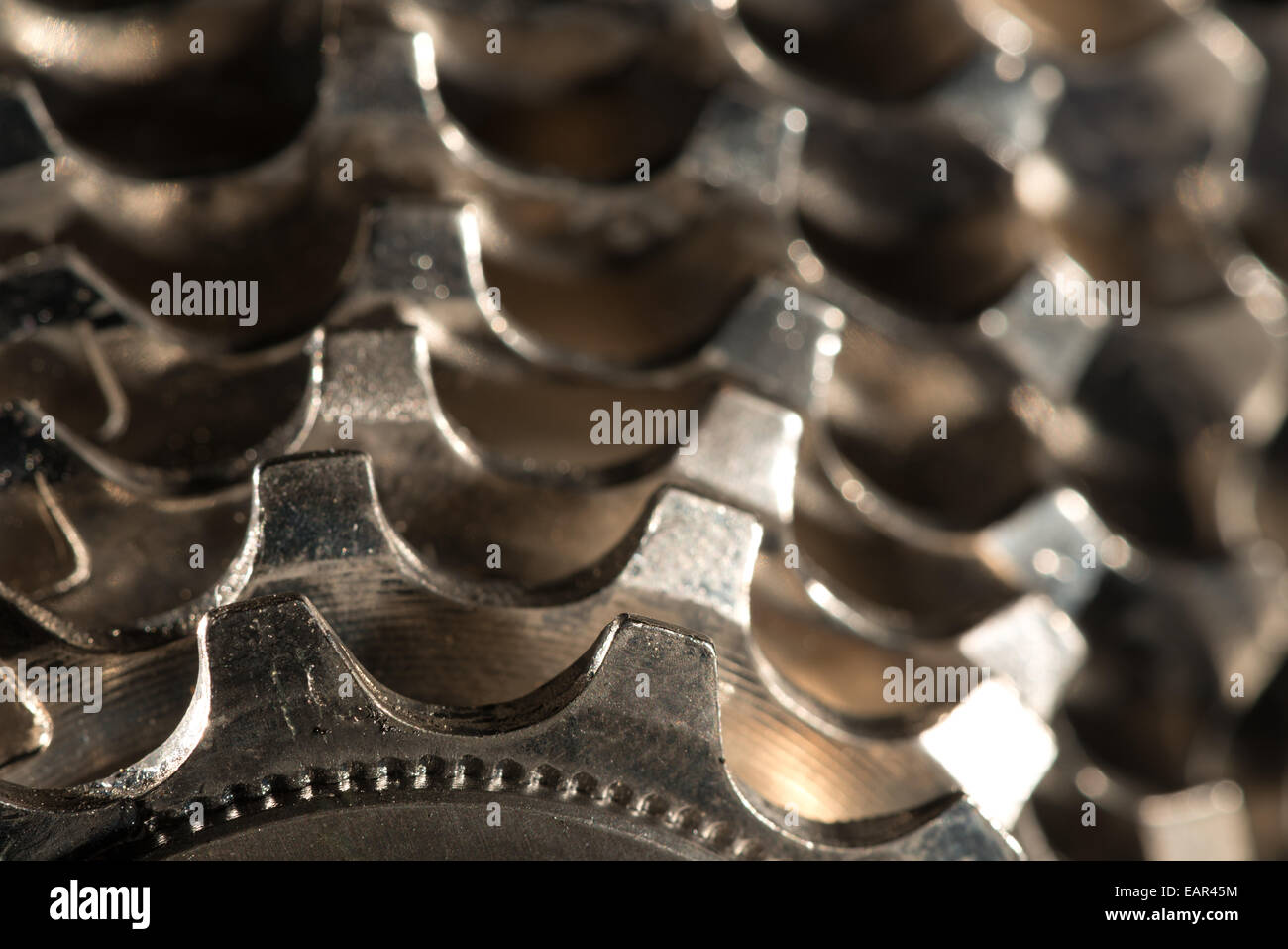 shiny metal bike gears new teeth showing slight hardly any wear and tear Stock Photo