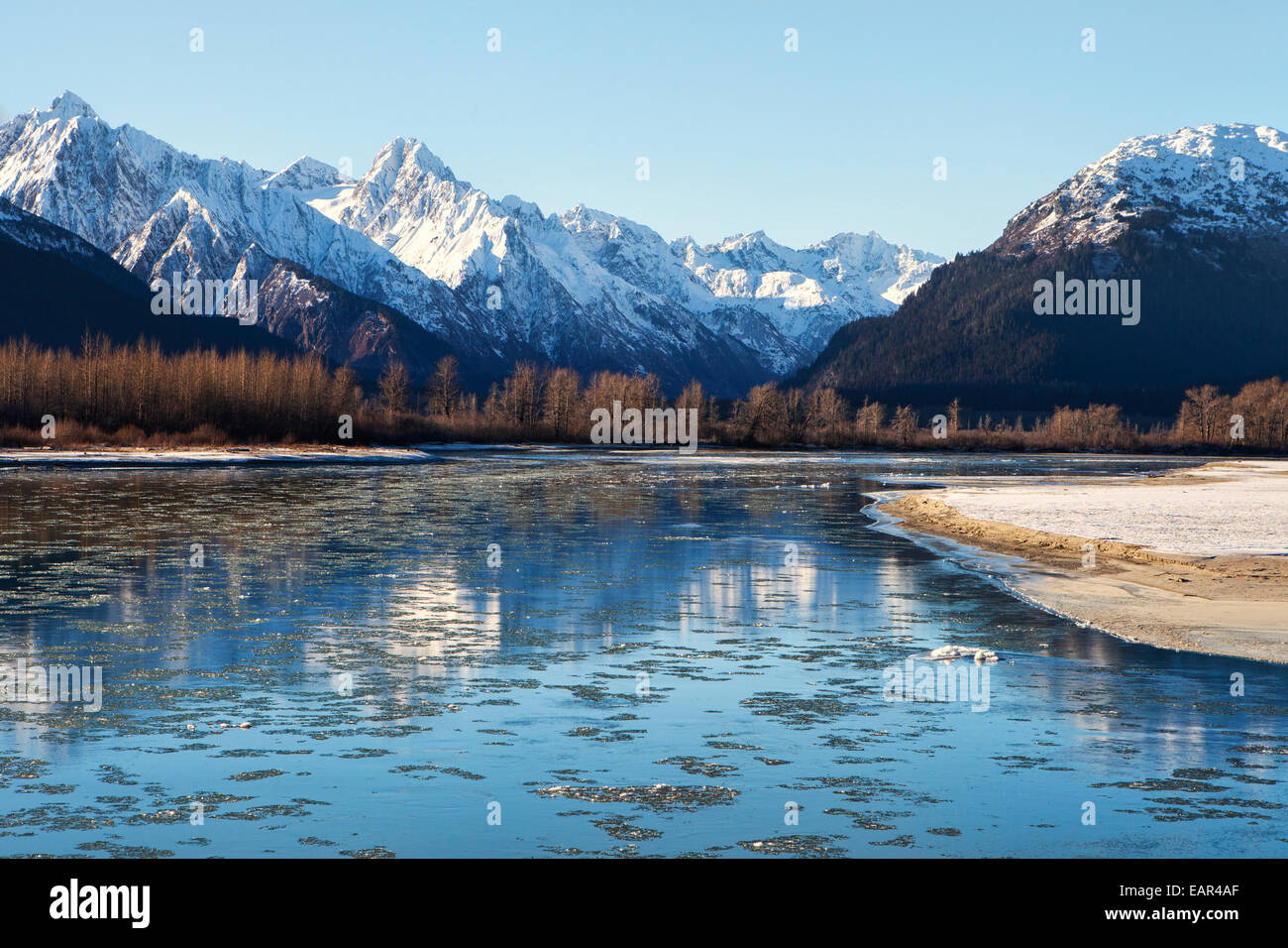 Ice floating in the Chilkat River near Haines Alaska on a sunny November day. Stock Photo