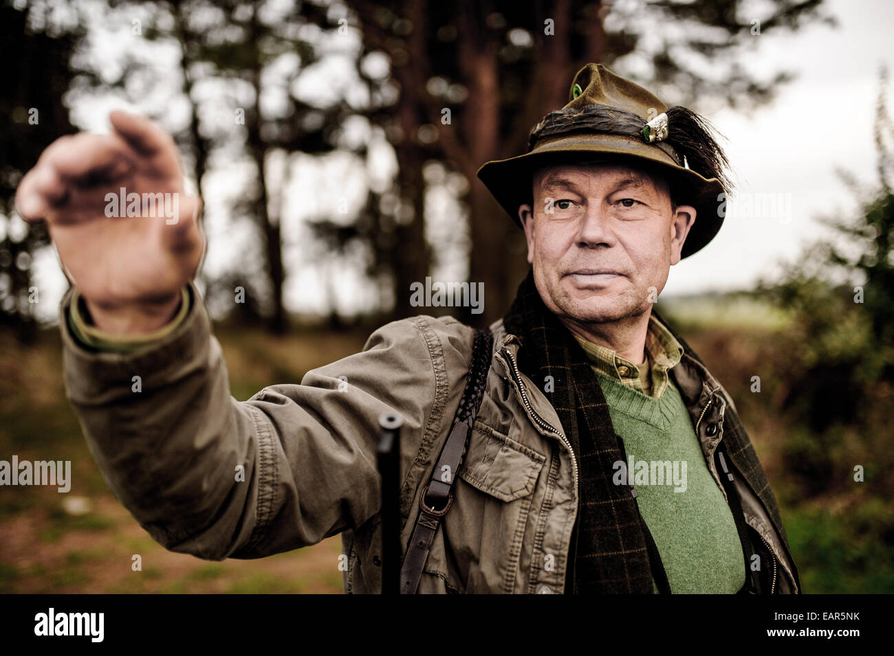 The hunter Wolfgang Wernicke in woods of Brandenburg Herzberg (Mark), on Oktober 30, 2014 in Germany. Photo: picture alliance/Robert Schlesinger Stock Photo