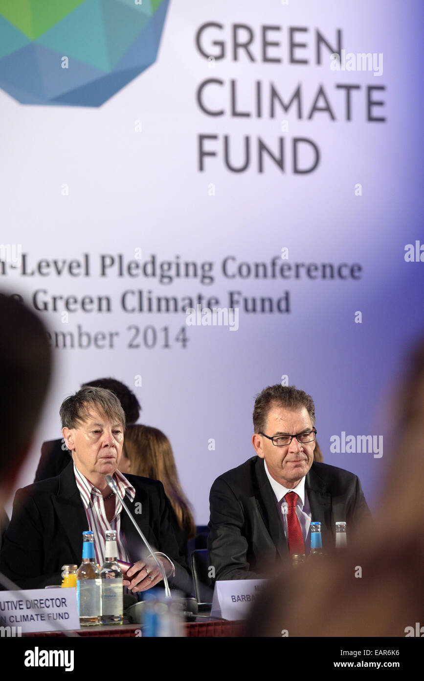 Berlin, Germany. 20th Nov, 2014. German Minister for the Environment, Nature Conservation and Nuclear Safety Barbara Hendricks (SPD) and German Minister of Economic Cooperation and Development Gerd Mueller (CSU) open the meeting of the Green Climate Fund (GCF) in the Federal Ministry for Economic Cooperation and Development in Berlin, Germany, 20 November 2014. The purpose of the GCF is to decelerate the global warming through financing projects of climate protection. Photo: Rainer Jensen/dpa/Alamy Live News Stock Photo