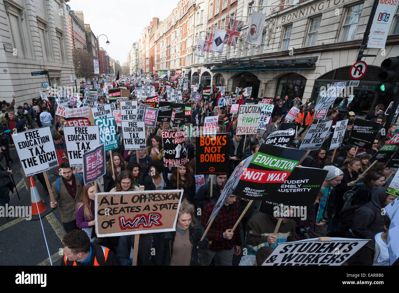 Southampton Row, London, UK. 19th November 2014. Thousands of students take part in a protest march along Southampton Row in central London. The demonstration against tuition fees, education cuts and debt eventually made its way to Parliament Square. Credit:  Lee Thomas/Alamy Live News Stock Photo