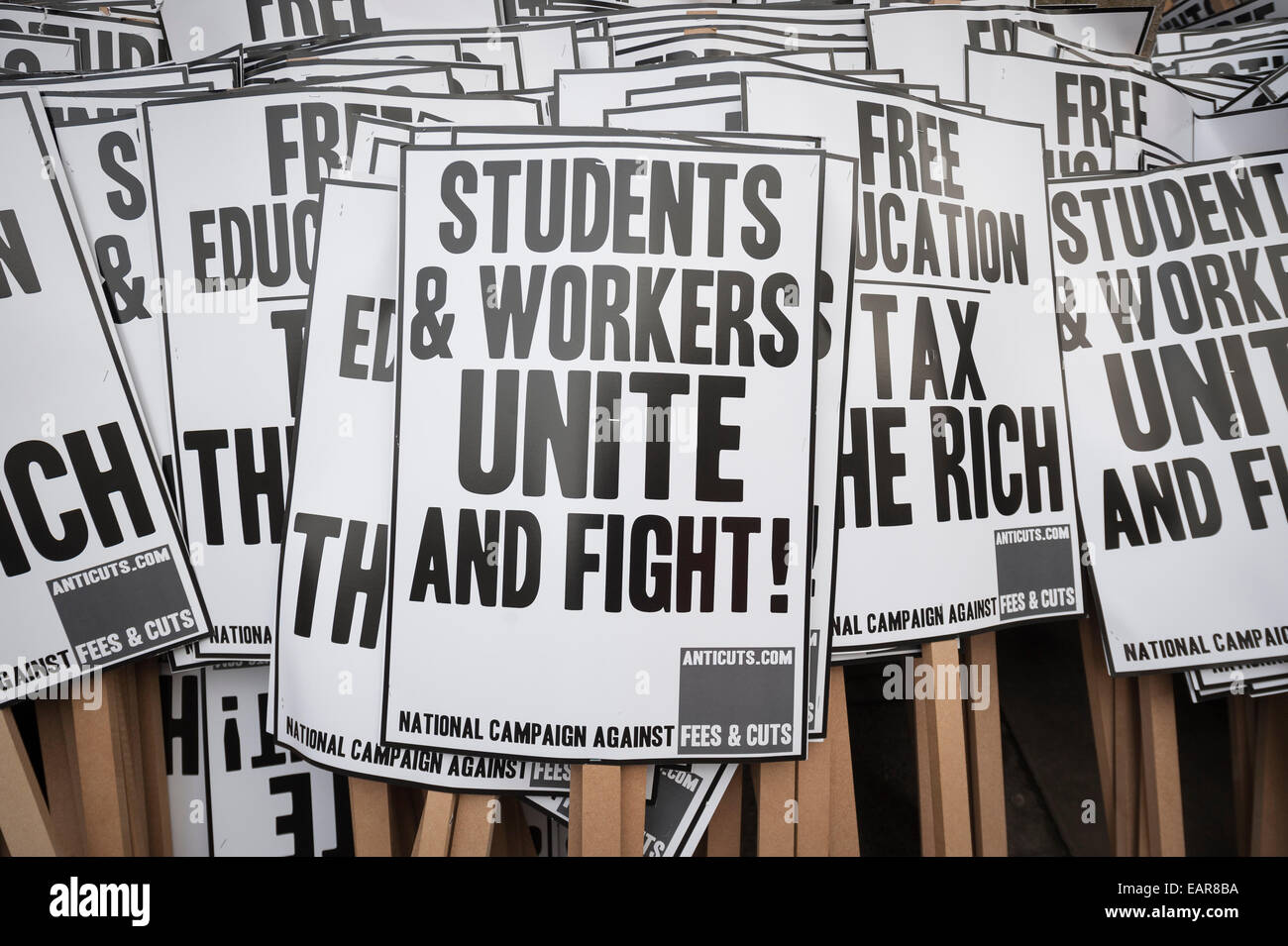 Malet Street, London, UK. 19th November 2014. Protest placards are ...