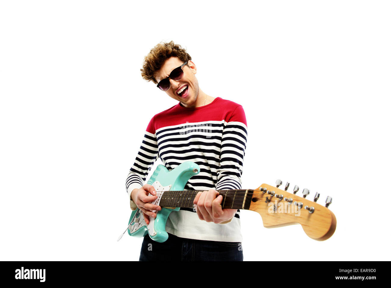 Funny fashion man playing on the guitar on a white background Stock Photo