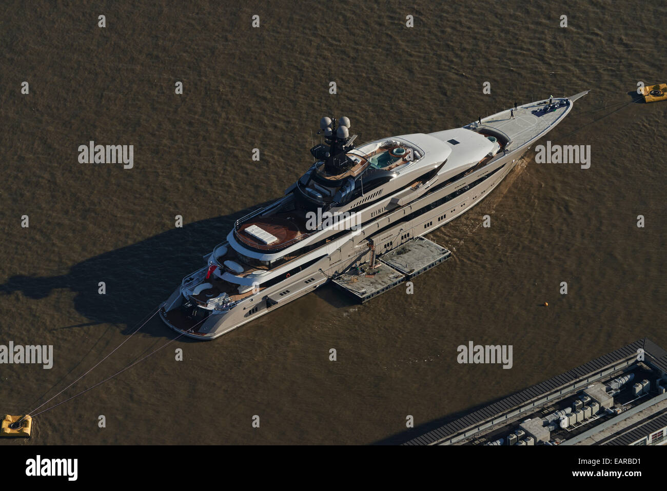An aerial view of a luxury motor yacht moored on the River Thames Stock Photo