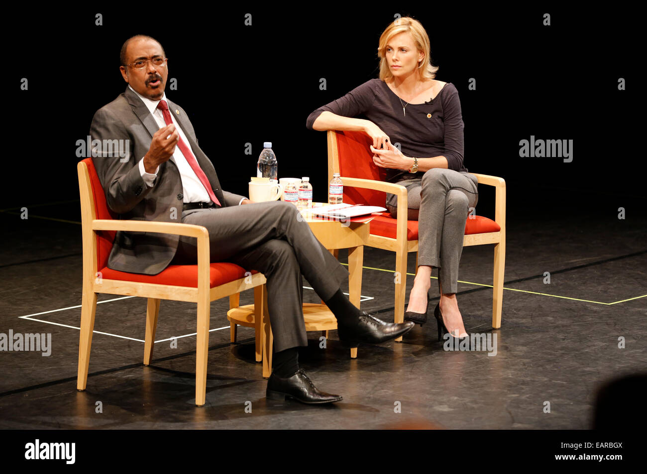 Executive Director of UNAIDS Michel Sidibe (L) and actress Charlize