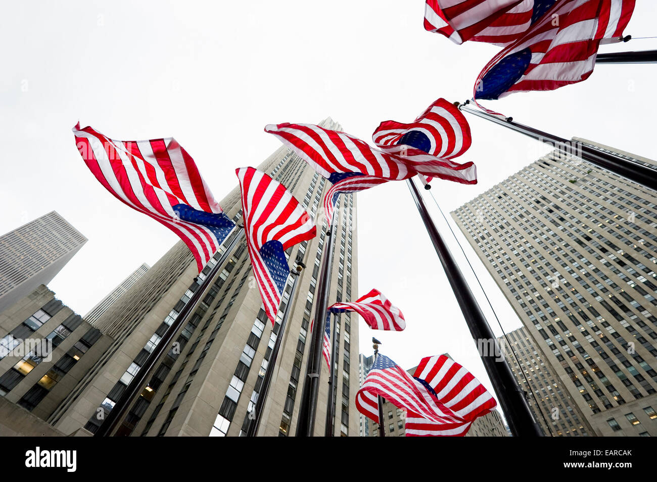 Rockefeller Center and American flags, Manhattan, New York City, New York, United States Stock Photo