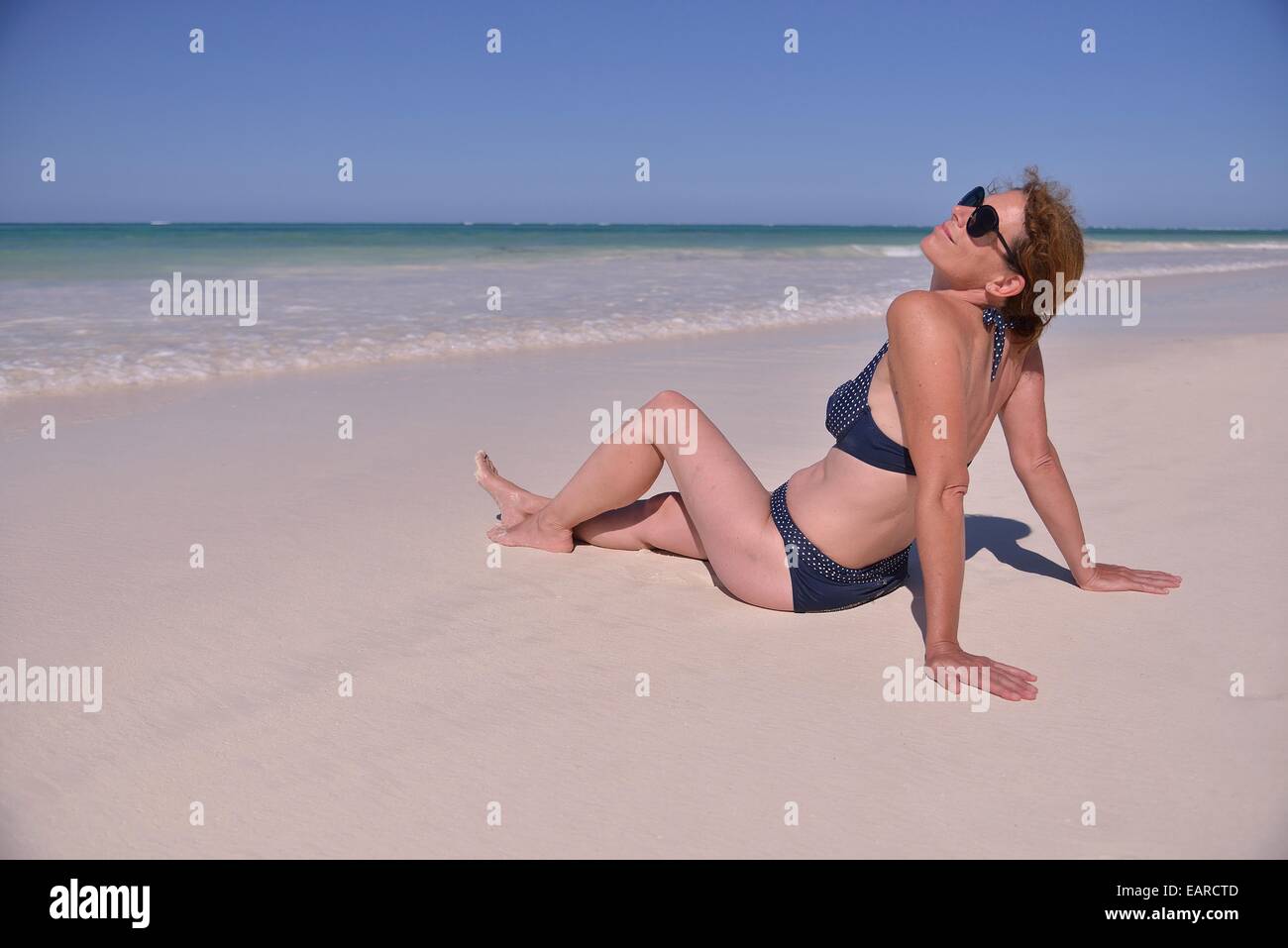 Woman Sunbathing Beach Hi Res Stock Photography And Images Alamy