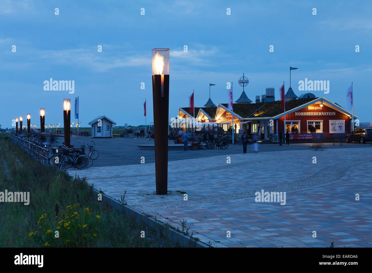 Gas beacons at the new pier at dusk, St. Peter-Ording, Eiderstedt, North Frisia, Schleswig-Holstein, Germany Stock Photo