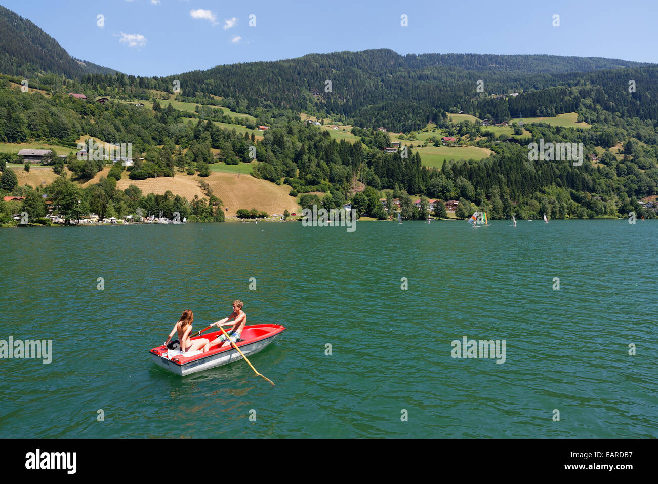 Rowboat on Brennsee or Feldsee lake, Feld am See, Carinthia, Austria Stock Photo