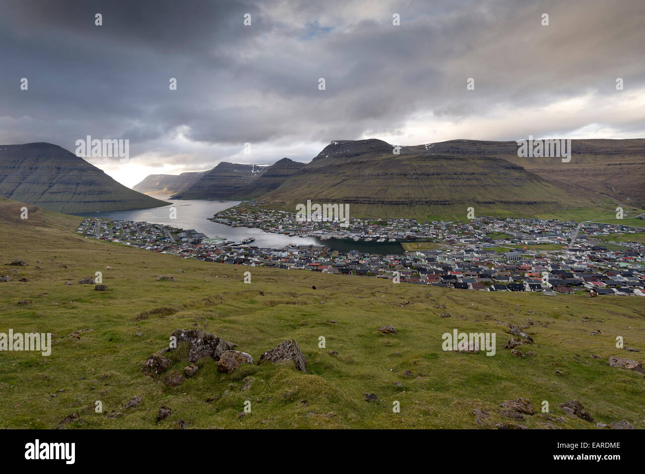 Mountains, fjord in the evening light, port and city, Klaksvik, Borðoy, Norðoyar, Faroe Islands, Denmark Stock Photo