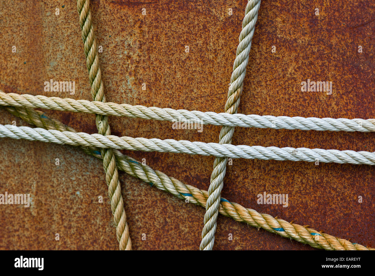 Taut ropes on a rusty surface, Mykines, Mykines, Faroe Islands, Denmark Stock Photo