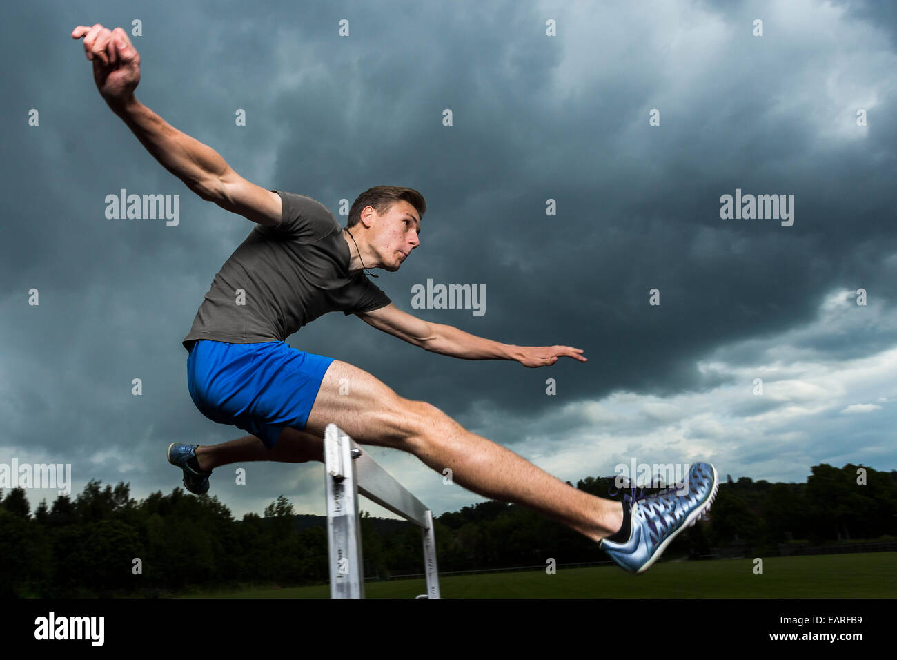 Athlete, 19 years, jumping hurdles, Winterbach, Baden-Württemberg, Germany Stock Photo