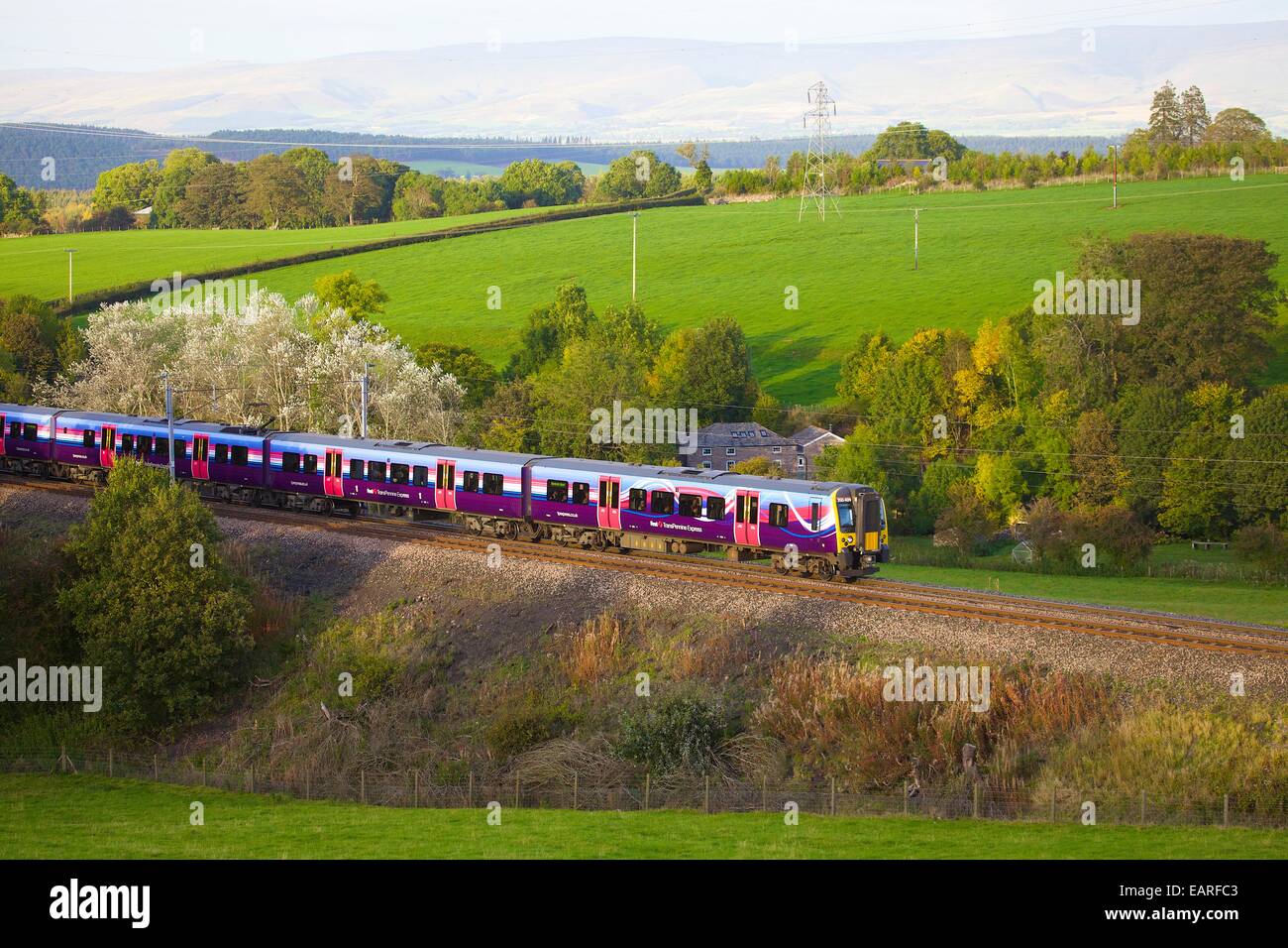 First Group Trans Pennine Express, Class 185 train passing Strickland Mill, Great Strickland, Cumbria, West Coast Main Line, UK. Stock Photo