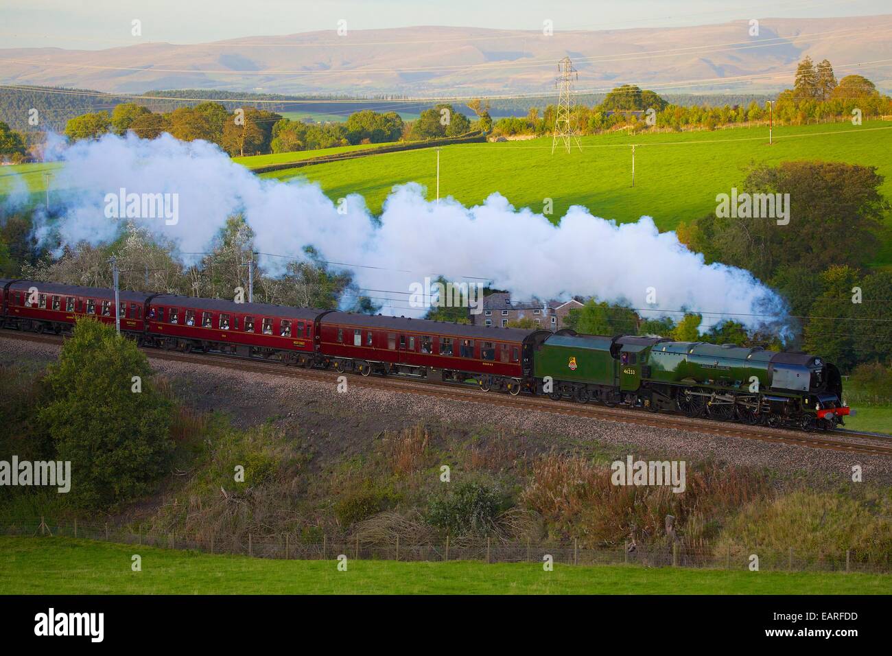 Steam locomotive Duchess of Sutherland. Strickland Mill, Great Strickland, Cumbria, West Coast Main Line, England, UK. Stock Photo