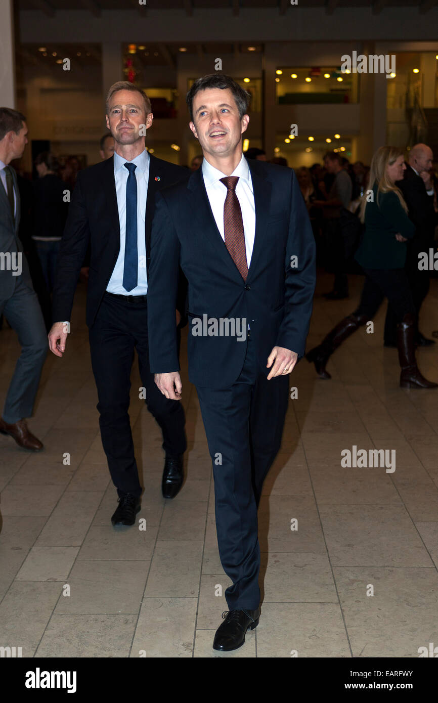Copenhagen, Denmark, November 19th, 2014: The The Danish Crown Prince Frederik (photo, right) arrives to the Creative Business Cup venue, Tivoli Congress Hotel, in Copenhagen. Photo, left, Mr. Rasmus Wiinstedt Tscherning, Director at Creative Business Cup. Stock Photo