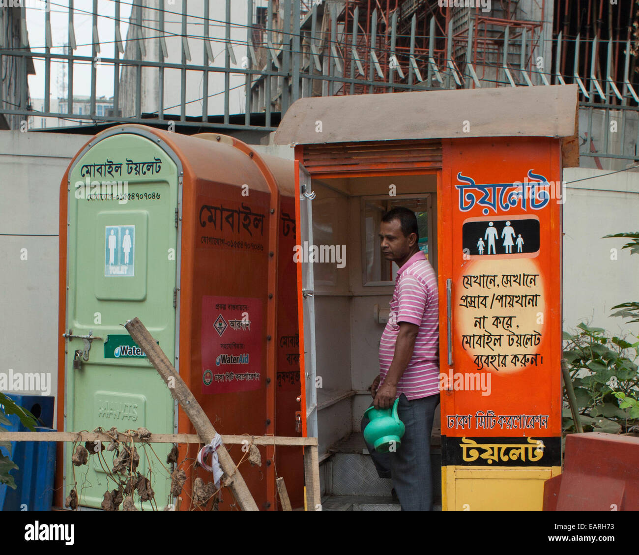 People uses Itinerant Mobile toilet beside street in Dhaka. Inadequate sanitation in South Asia