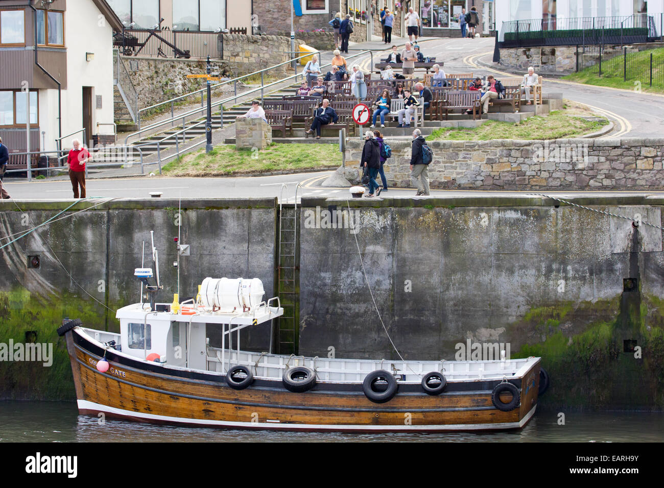 Seahouses harbour and boats for trips to the Farne Islands Stock Photo ...